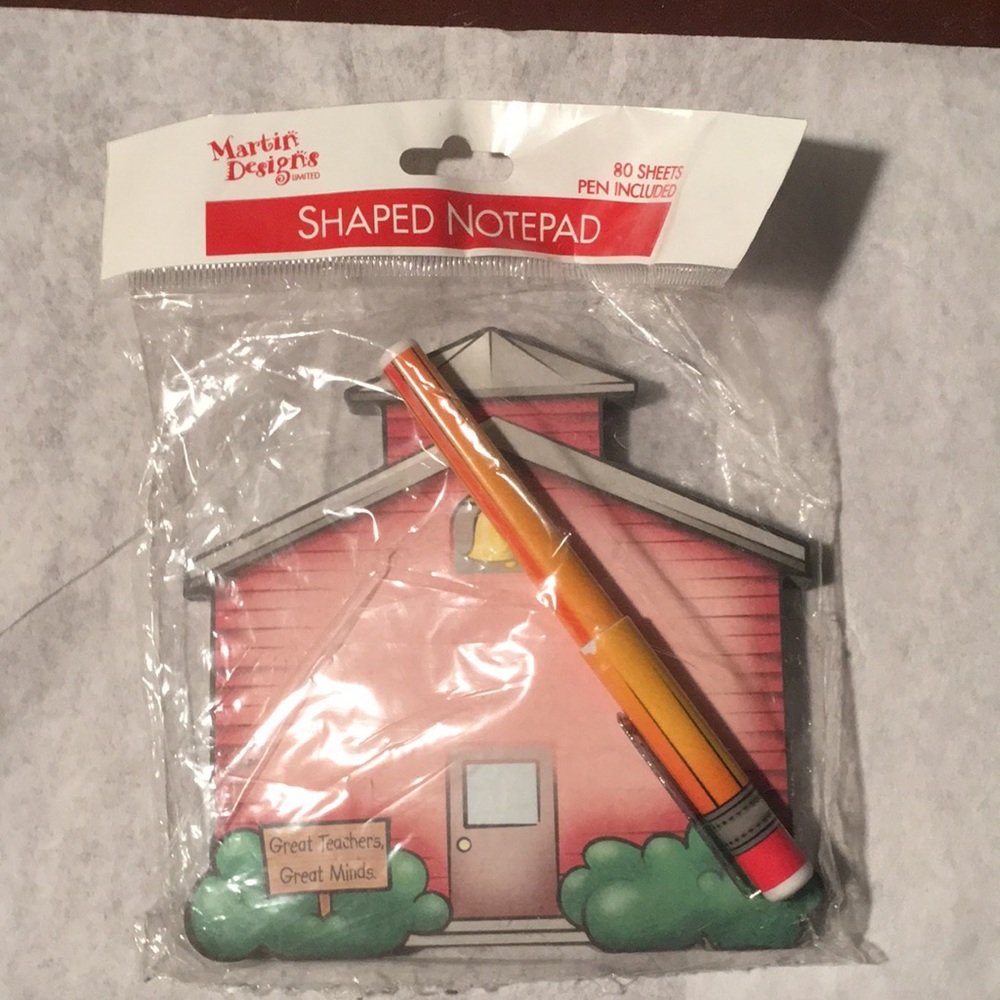 Schoolhouse shaped notepad and pen.